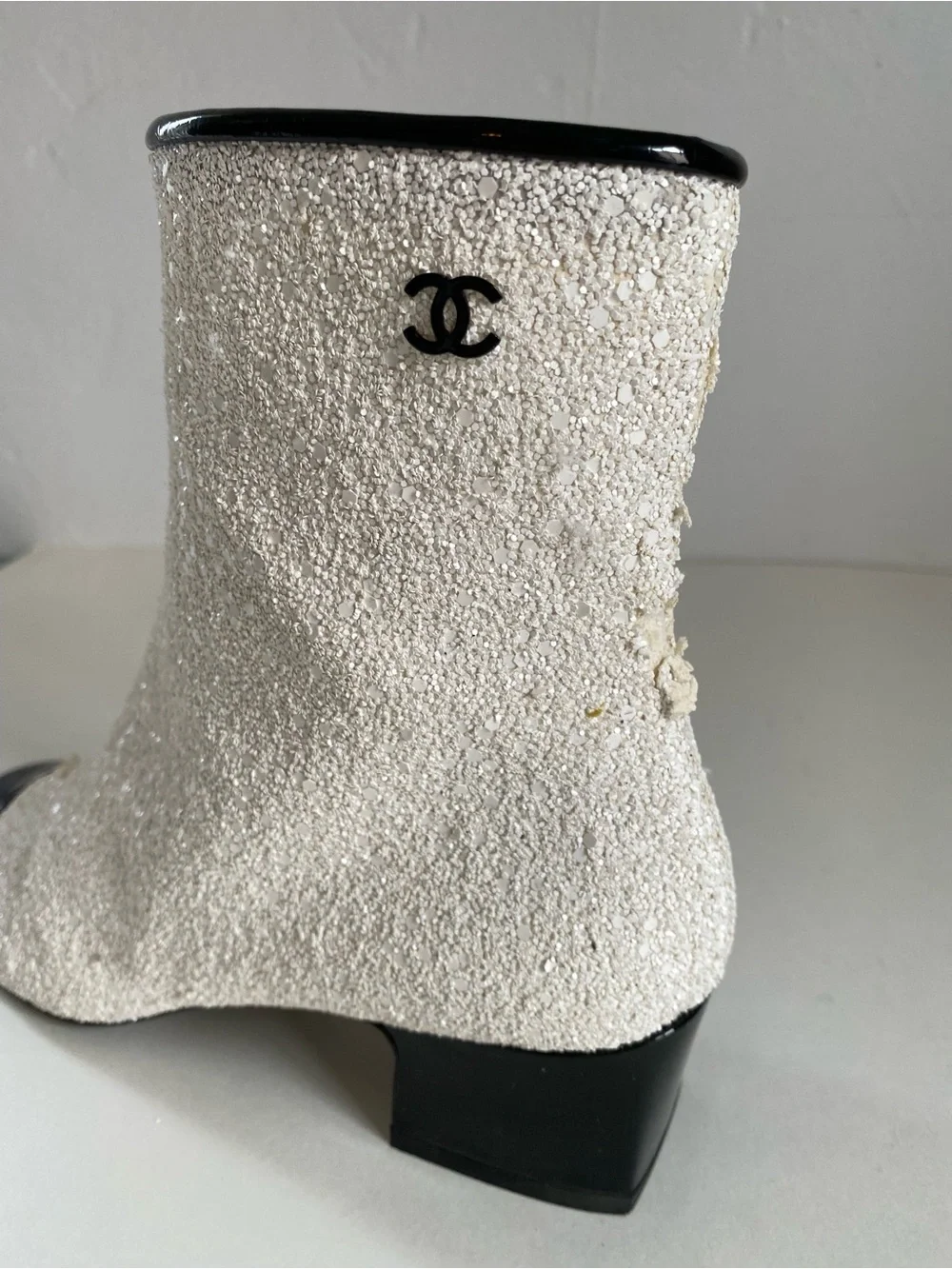 CHANEL White Sequin Ankle Boots with Black Cap Toe. Runway astronaut collection.